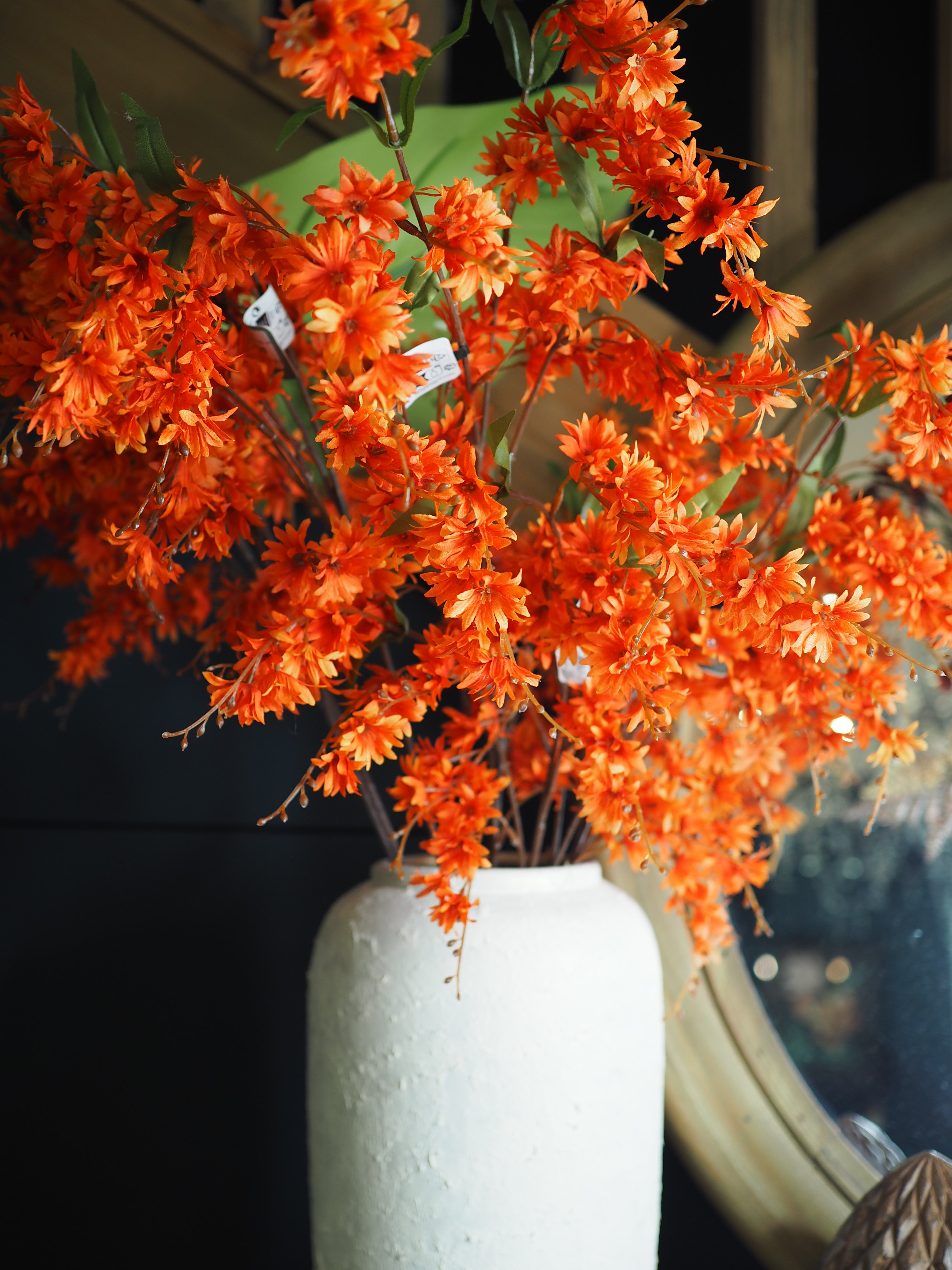 Tall orange daisy spray