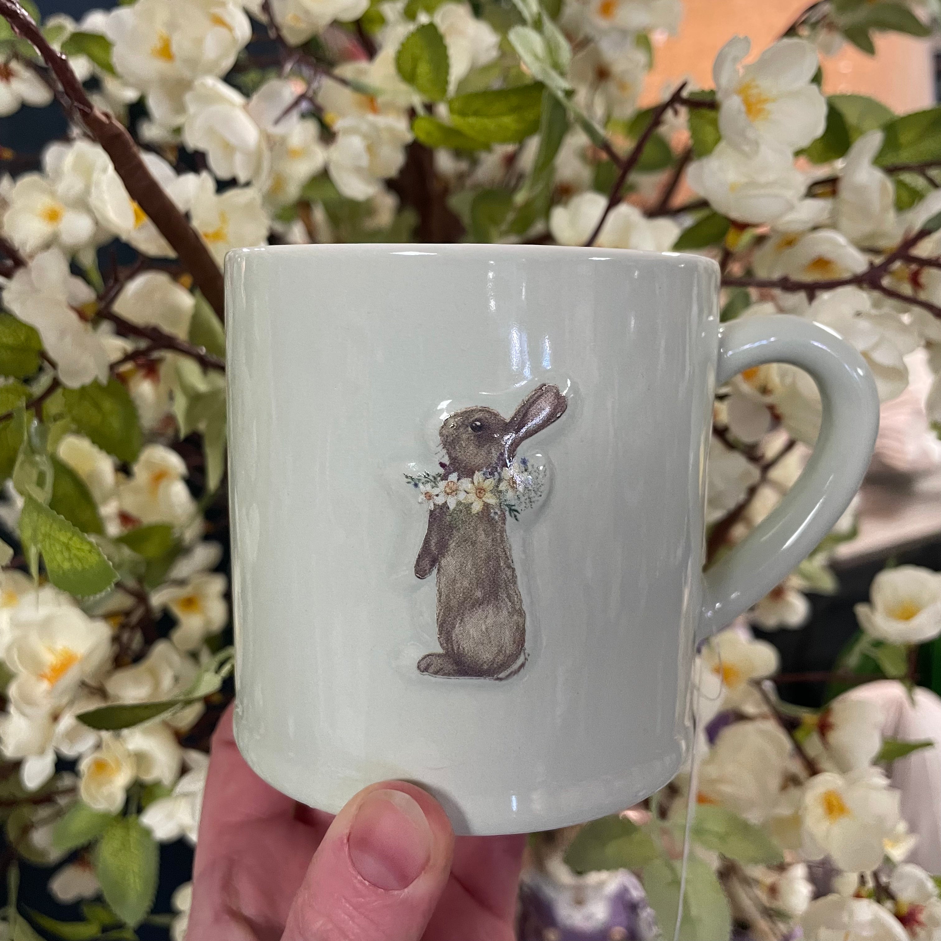 Stoneware embossed rabbit with flowers mug