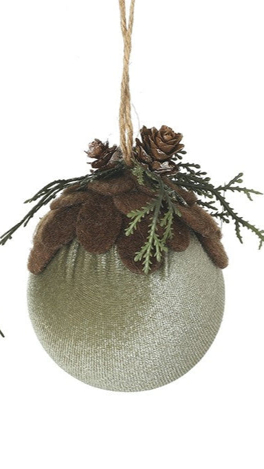Two decorative ornaments with pinecones and greenery on a white background
