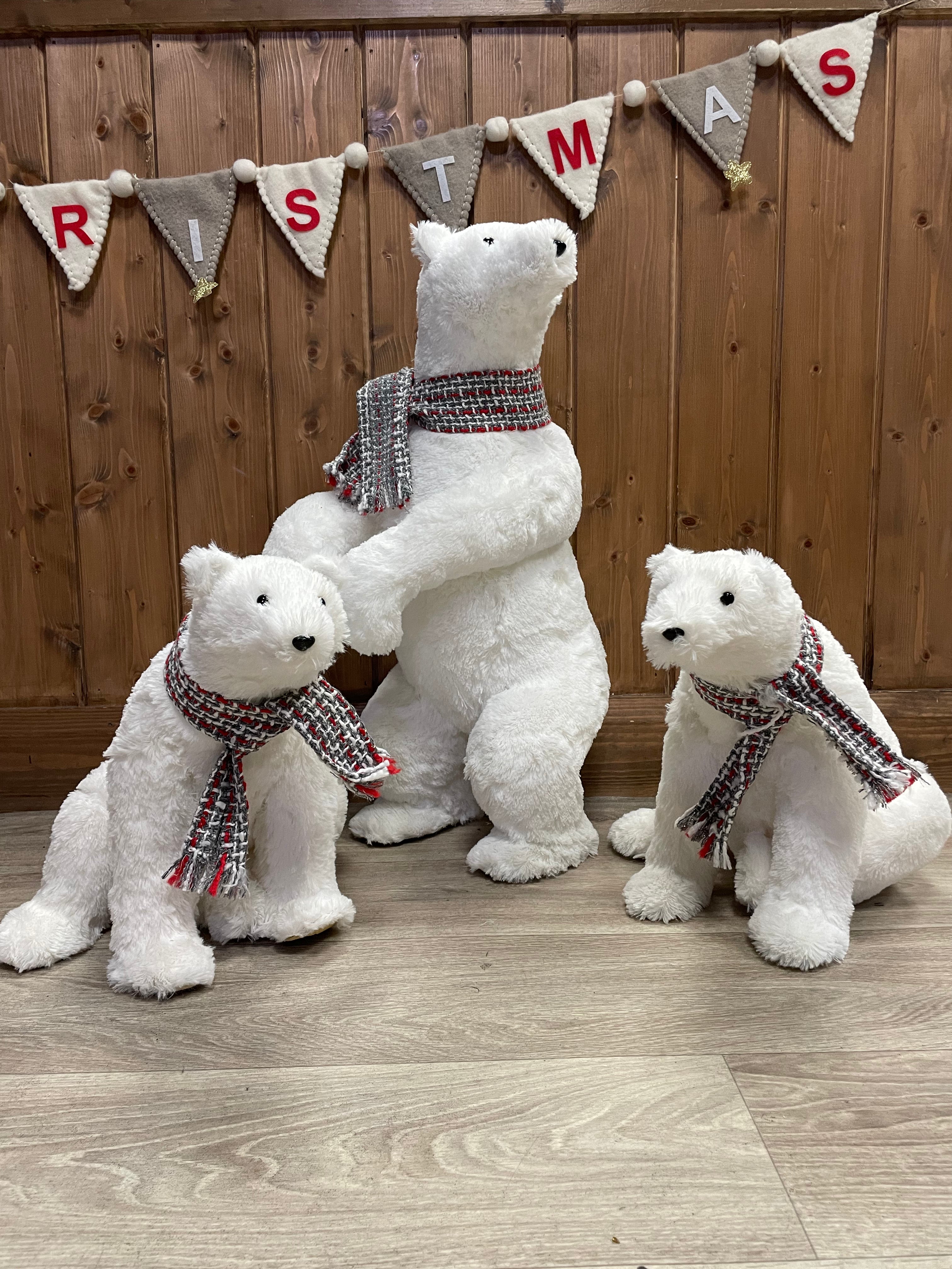Tall polar bear with scarf