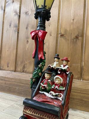 Carol singers on sleigh ornament