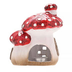 Multi toadstool cottage candle holder (15cmH)