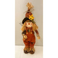 Small scarecrow standing figure