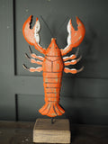 Rustic wood lobster on plinth ornament