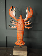 Rustic wood lobster on plinth ornament