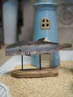 Rustic wood blue whale on plinth ornament
