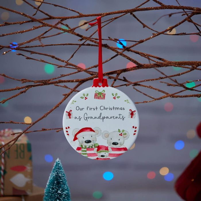 First Christmas as grandparents hanging decoration