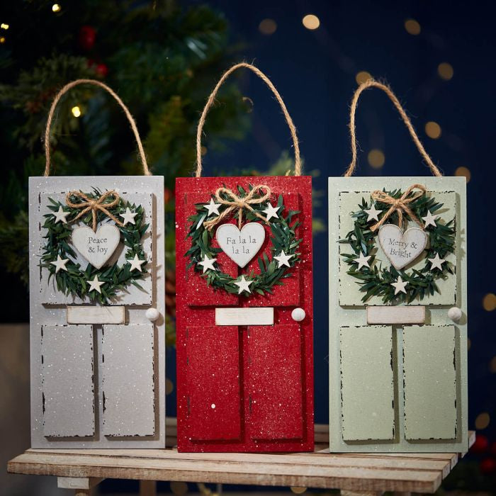 Christmas front door hanging dec with festive message