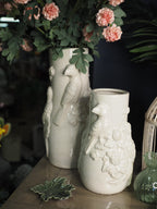 Cream porcelain parrot embossed vase (24.5cmH)