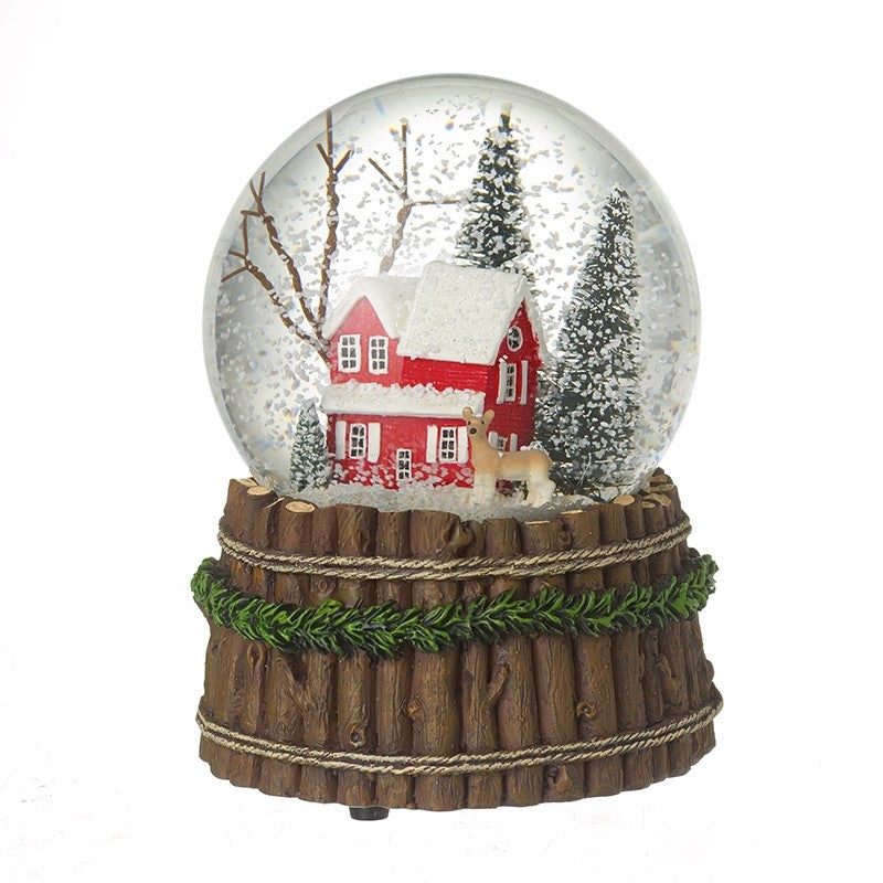 Musical snow globe with red house scene