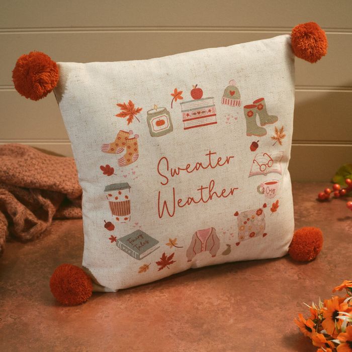 Cosy chapter sweater weather cushion with Pom poms