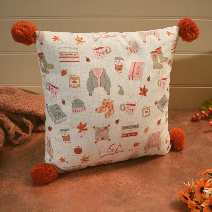 Cosy chapter sweater weather cushion with Pom poms