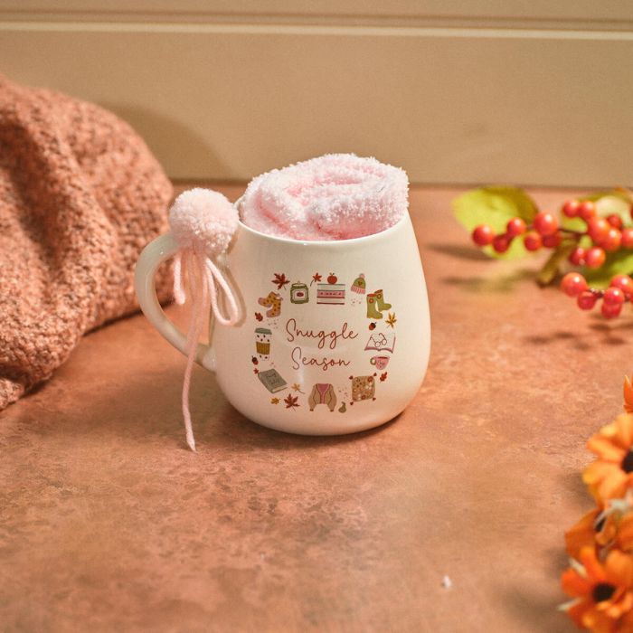Cozy chapter snuggle season mug with fluffy socks