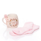 Cozy chapter snuggle season mug with fluffy socks