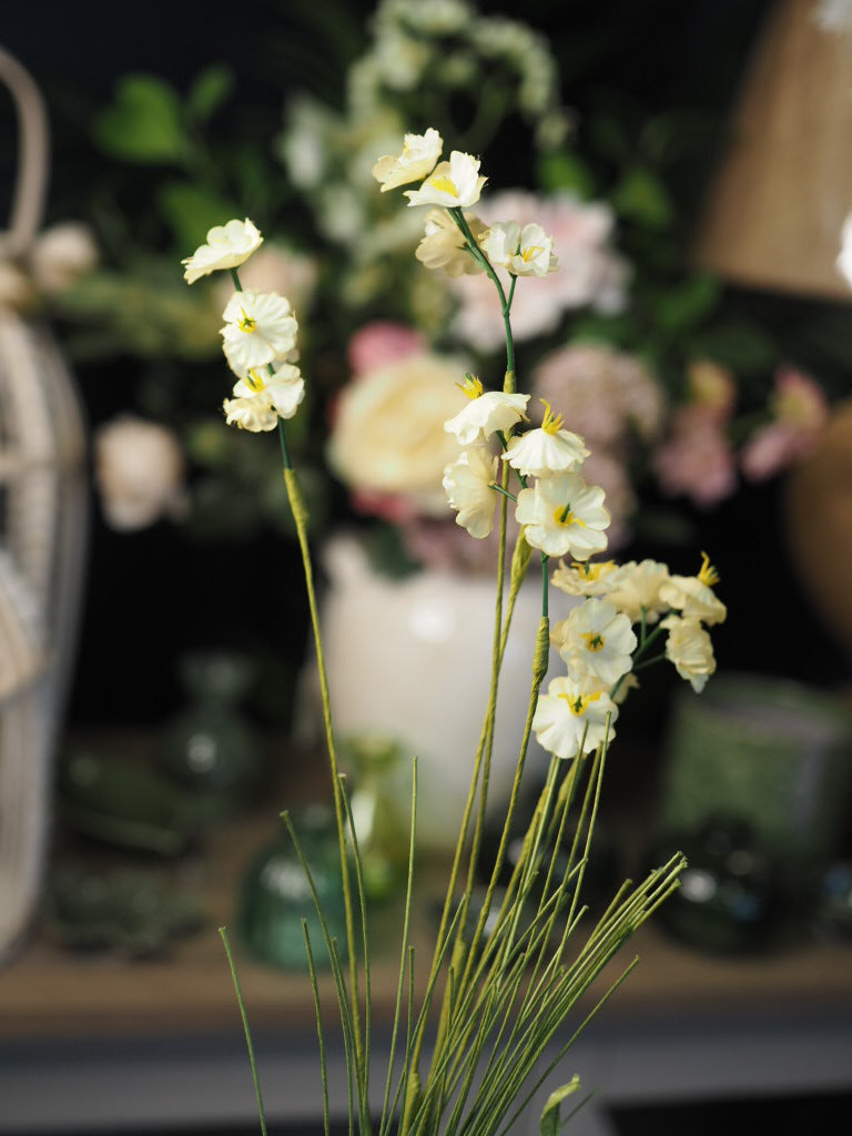 Yellow miniature rose spray