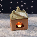 Christmas market stoneware toy shop tealight house
