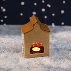 Christmas market stoneware books & gifts shop tealight house