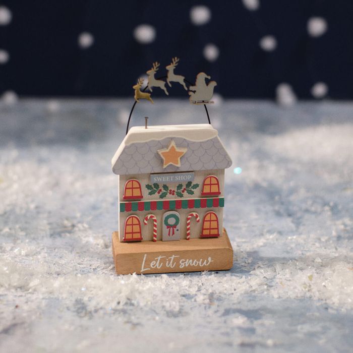 Christmas market let is snow wooden shop