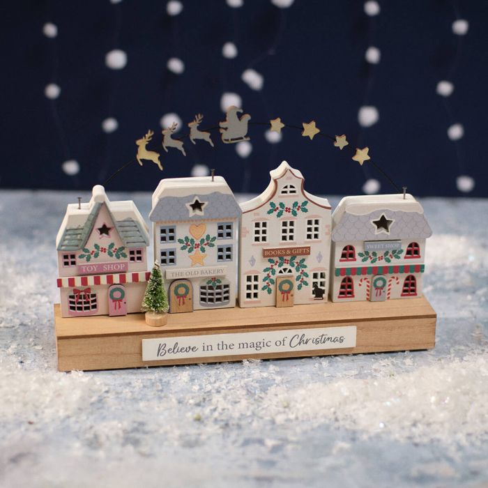 Christmas market Believe in the magic of Christmas cute wooden shops