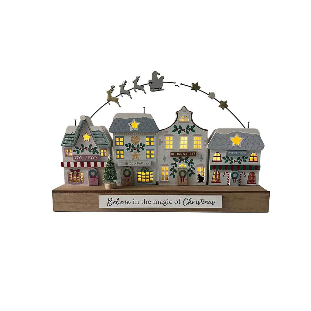 Christmas market Believe in the magic of Christmas cute wooden shops
