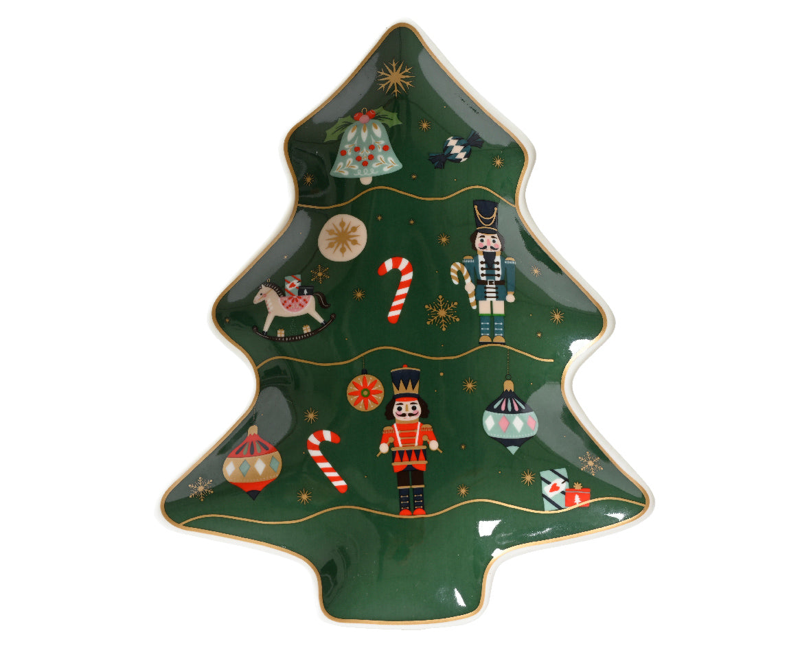 Green Christmas tree shaped plate with nutcracker print