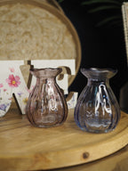 Ribbed glass bud vase with flute top
