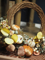 Autumn pumpkin and berry wreath