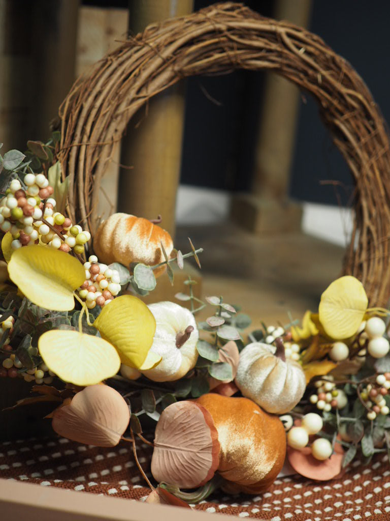 Autumn pumpkin and berry wreath