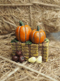 Orange pumpkins on hay bale mini ornament