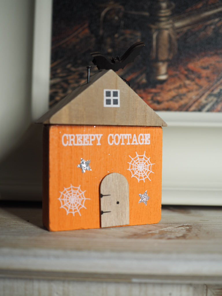 Wooden orange creepy cottage