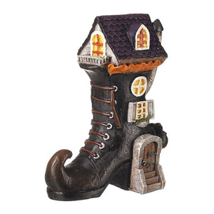 Black witch’s boot house