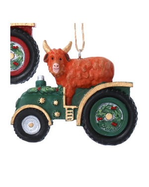 Dairy/highland cow in tractor hanging dec