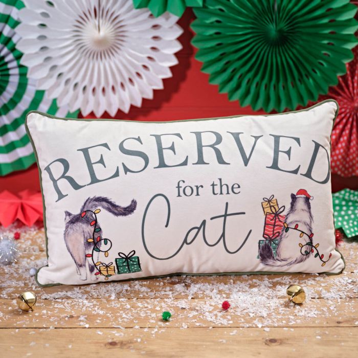 Furry and festive reserved for the cat cushion