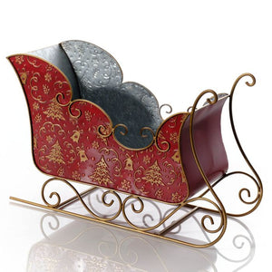 Metal sleigh with embossed Christmas trees and bells