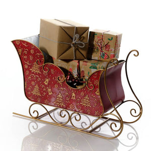 Metal sleigh with embossed Christmas trees and bells