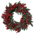 Spruce with varied red berries wreath