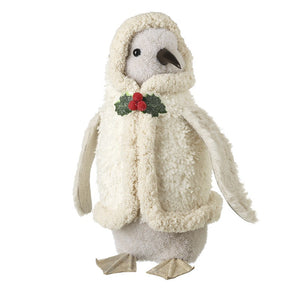 Penguin in fluffy beige coat