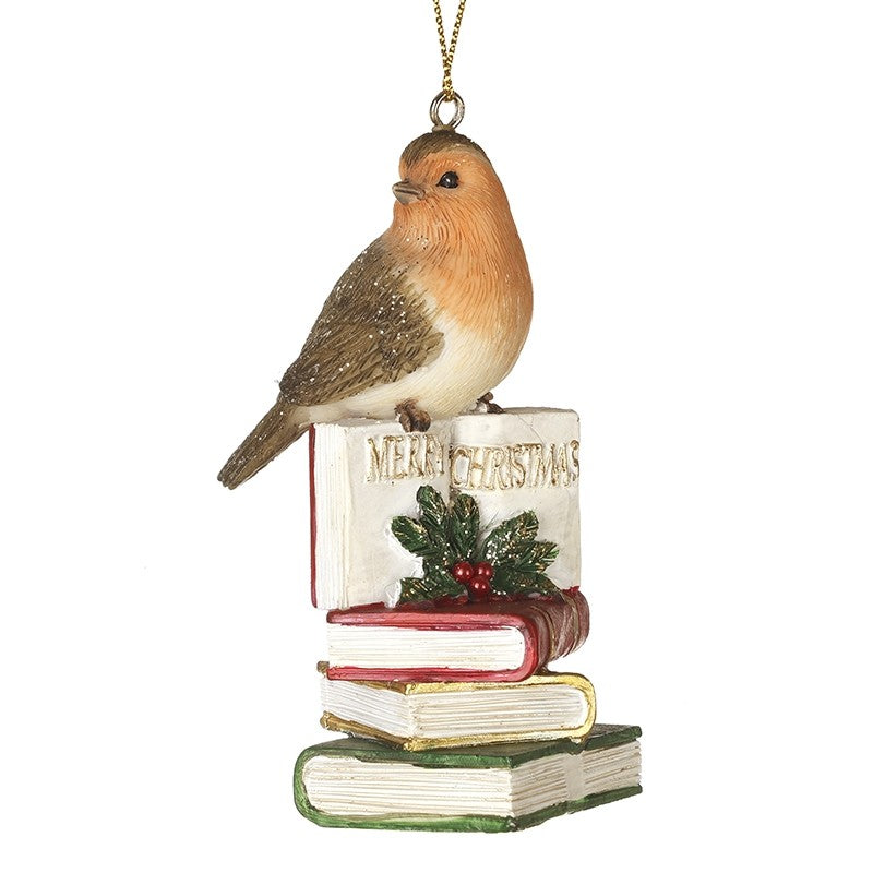Hanging Christmas robin on book stack