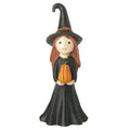 Girl witch holding a squash