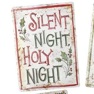 Four Christmas-themed cards with festive sayings on a white background