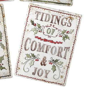 Four Christmas-themed cards with festive sayings on a white background
