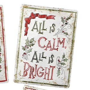 Four Christmas-themed cards with festive sayings on a white background