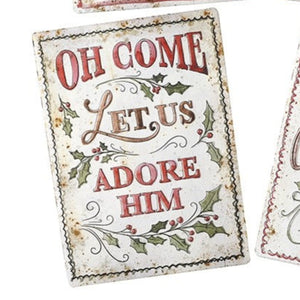Four Christmas-themed cards with festive sayings on a white background
