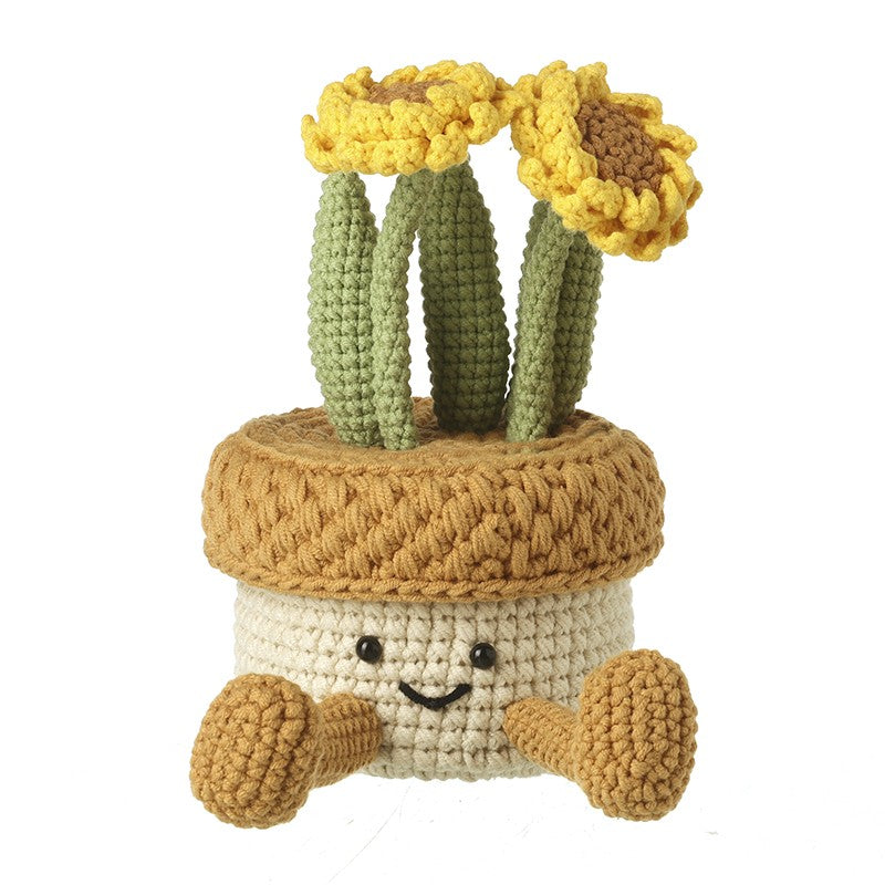 Smiley crochet cacti in plant pot