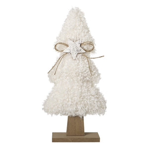 White fluffy Christmas tree with silver star