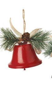 Two Christmas bell ornaments with greenery and pinecones on a white background