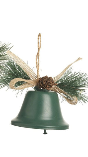 Two Christmas bell ornaments with greenery and pinecones on a white background