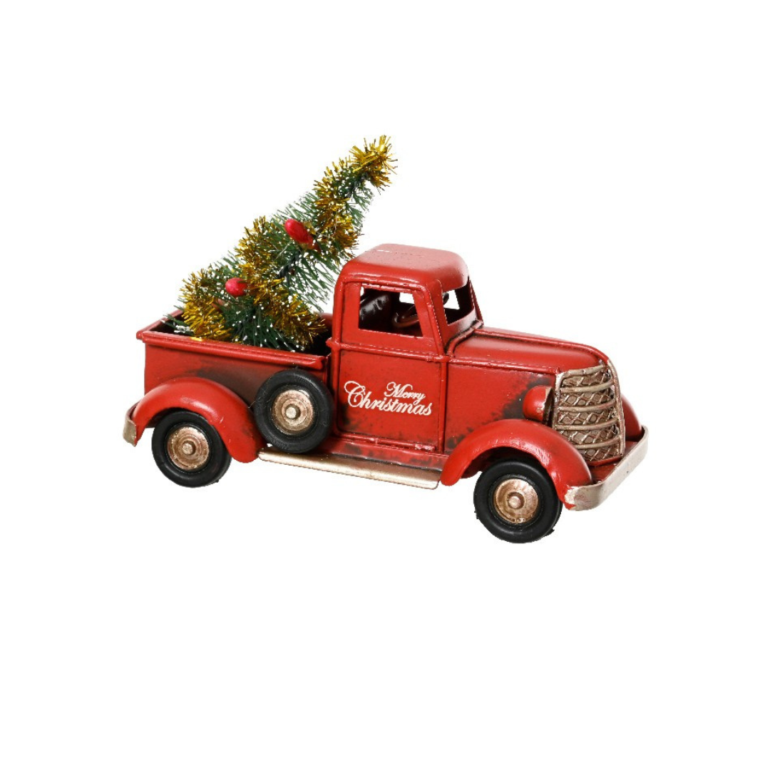 Vintage Truck carrying a Christmas Tree