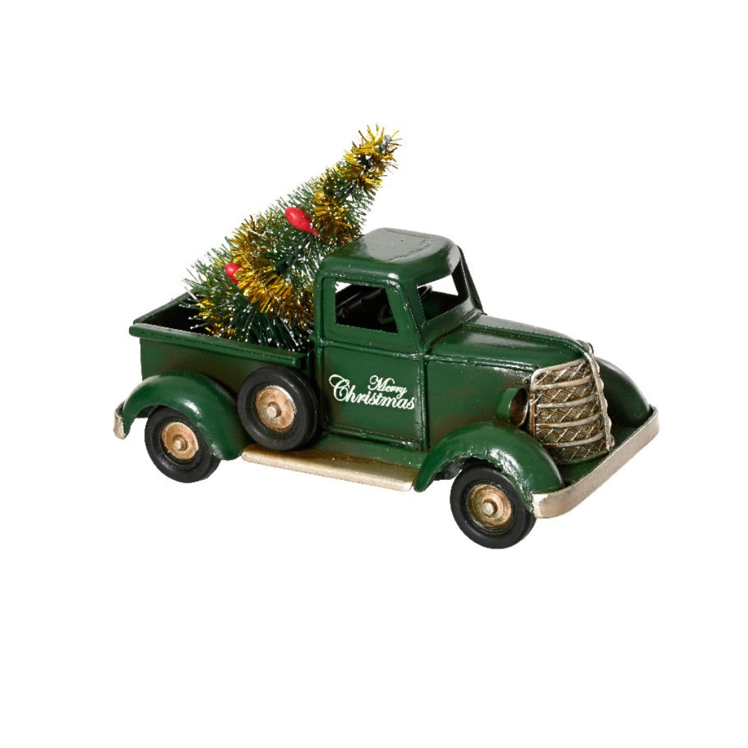 Vintage Truck carrying a Christmas Tree