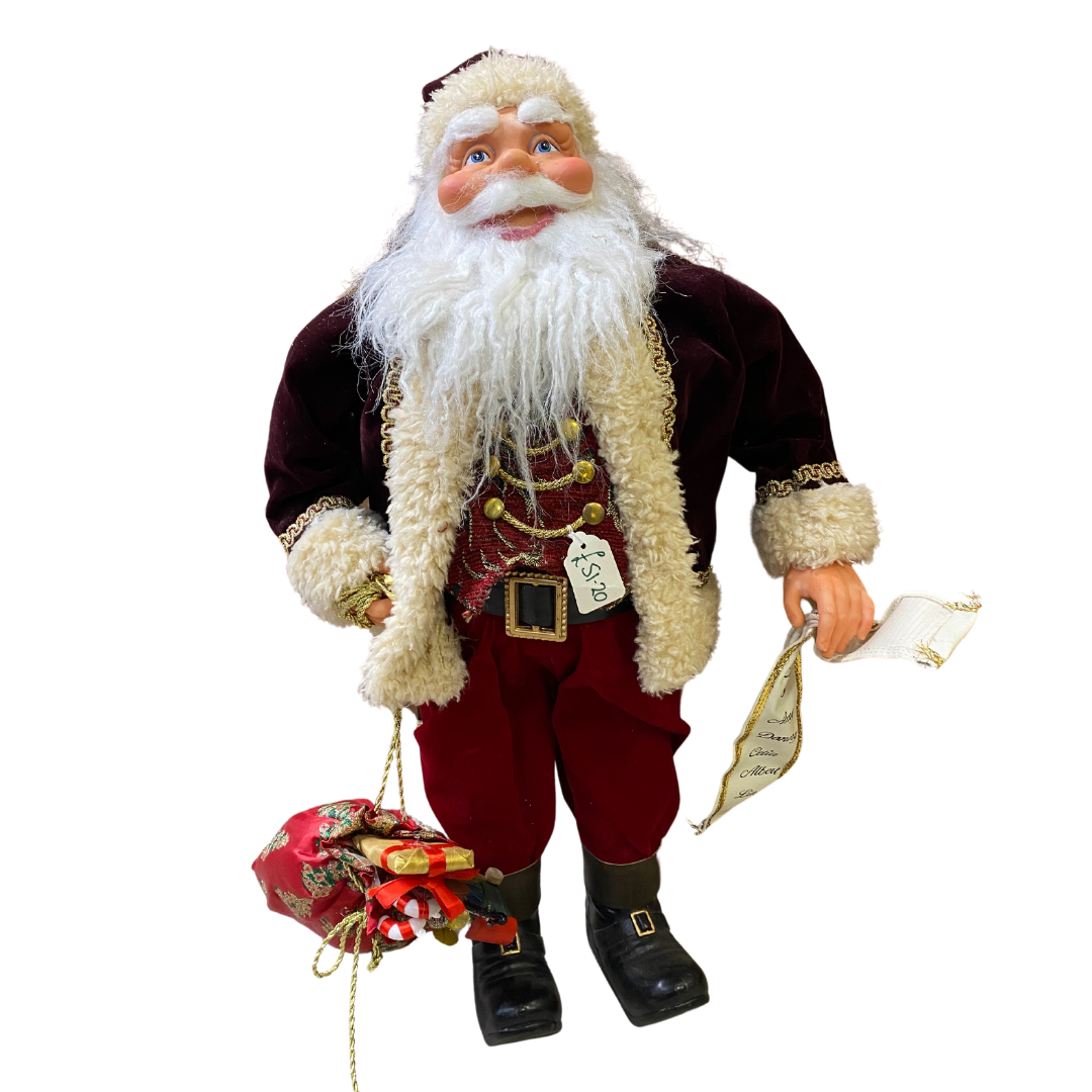 62cm Traditional Santa Claus holding a bag of presents